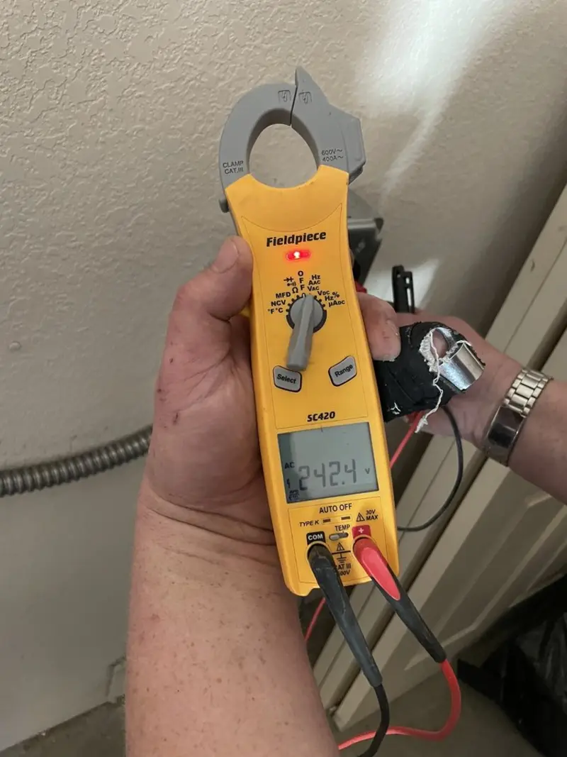 Voltage testing with clamp meter during Generator Installation in Texas